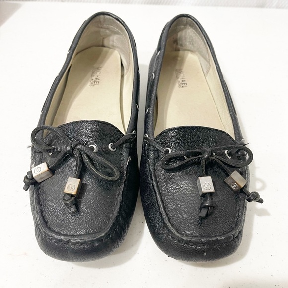 Michael Kors Amber Black pebbled tassel flats. - Picture 3 of 13
